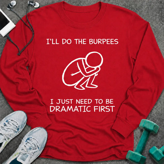 Red long sleeve tee printed with "I'll Do The Burpees, I Just Need To Be Dramatic First" in white, with a line drawing of a figure slumped on the floor