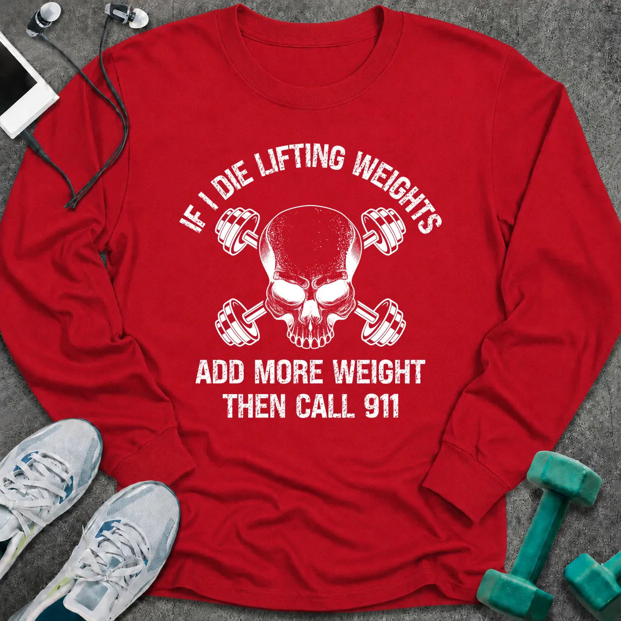 Red long sleeve tee printed with "If I Die Lifting Weights Add More Weight Then Call 911" in white, with a skull with crossed dumbbells