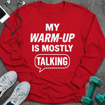 Red long sleeve tee printed with "My Warm-Up Is Mostly Talking" in white, with a speech bubble around the last word
