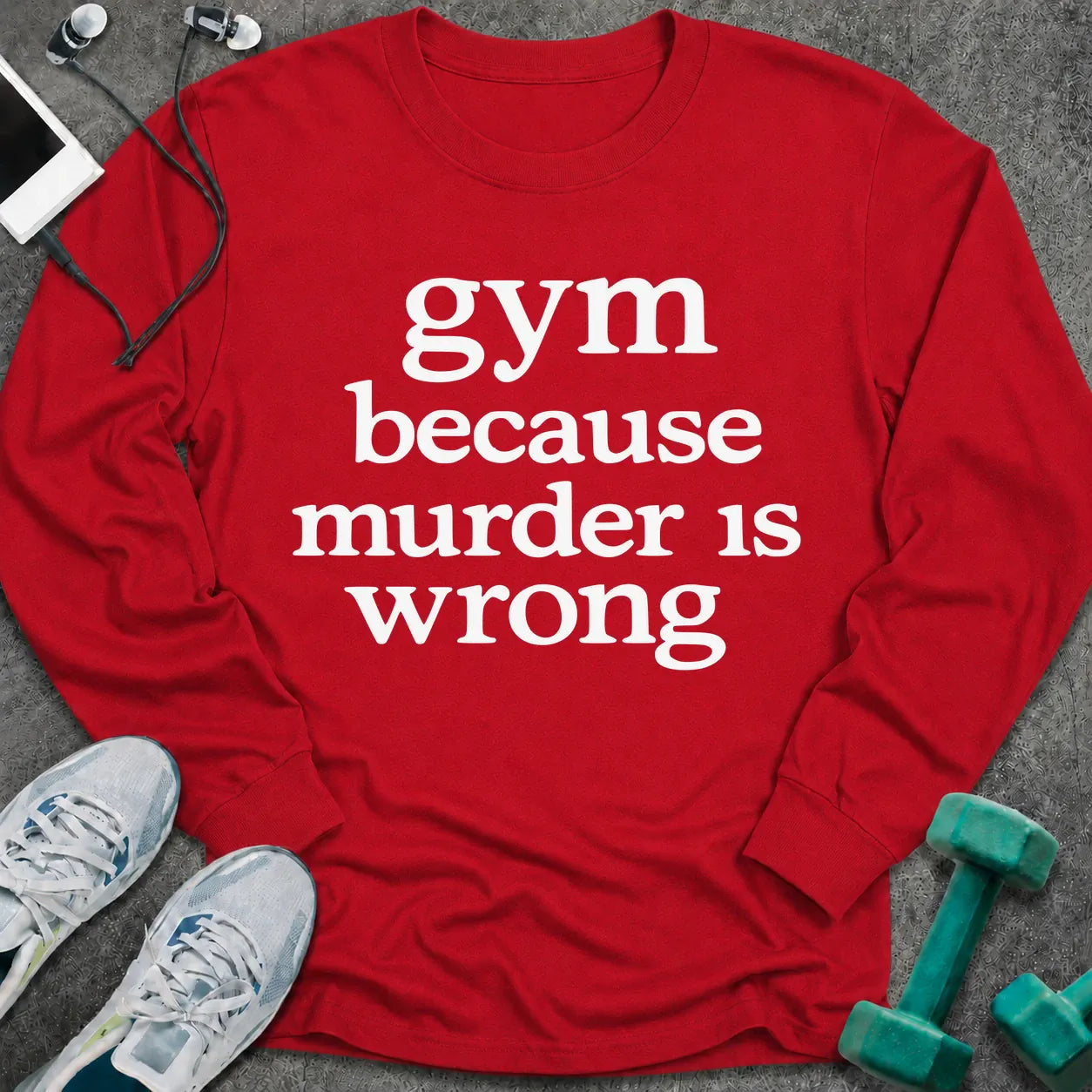 Red long sleeve tee printed with "gym because murder is wrong" in white serif lettering