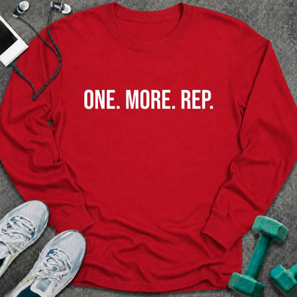 Red long sleeve tee printed with "One. More. Rep." in white