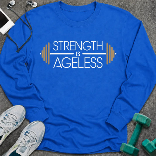Royal long sleeve tee printed with "Strength is Ageless" in white and gold, with a barbell framing the words