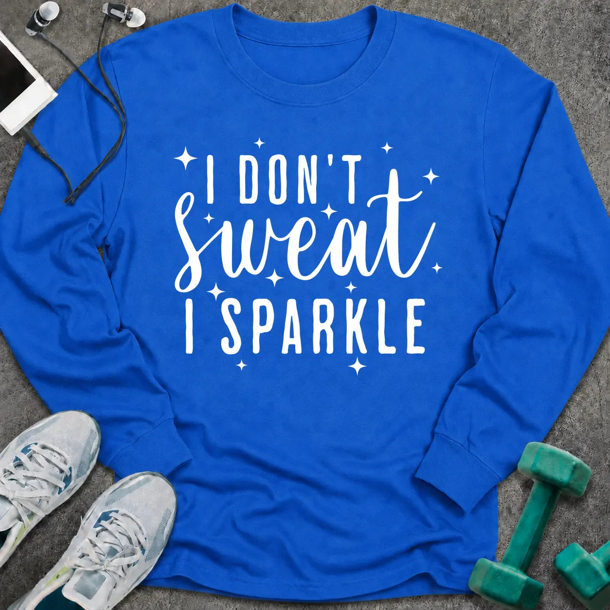Royal long sleeve tee printed with "I Don't Sweat I Sparkle" in white script, with sparkle stars