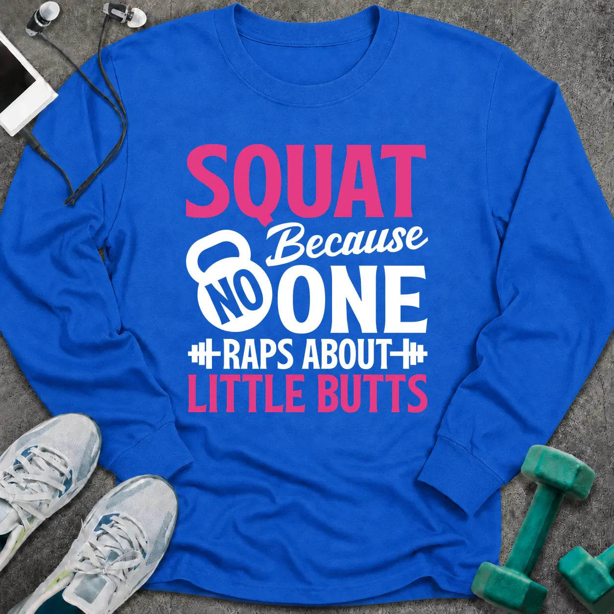 Royal long sleeve tee printed with "Squat Because No One Raps About Little Butts" in pink and white, with a kettlebell and dumbbells worked into the lettering