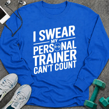 Royal long sleeve tee printed with "I Swear My Personal Trainer Can't Count" in white, with a dumbbell set into the lettering