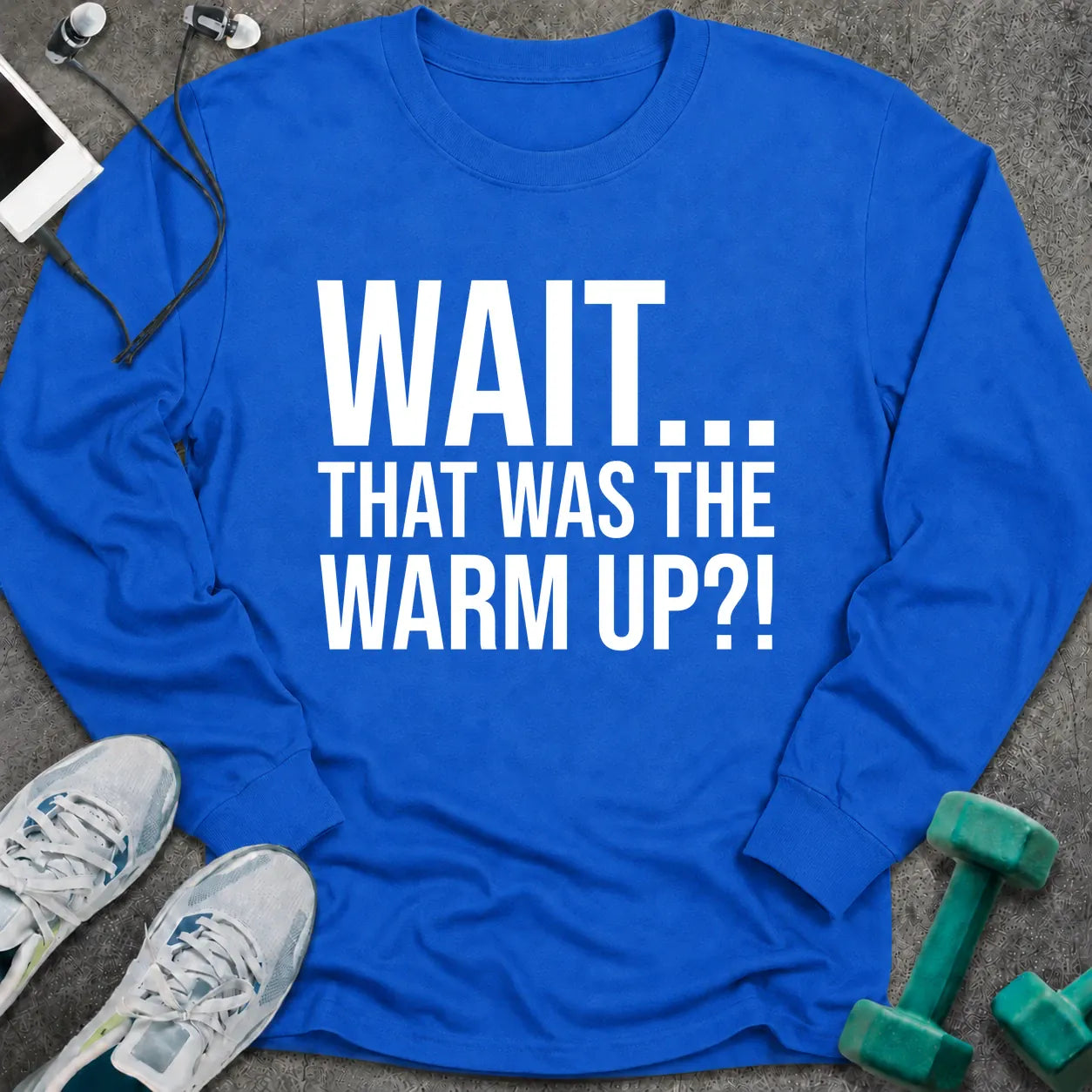 Royal long sleeve tee printed with "Wait... That Was The Warm Up?!" in white