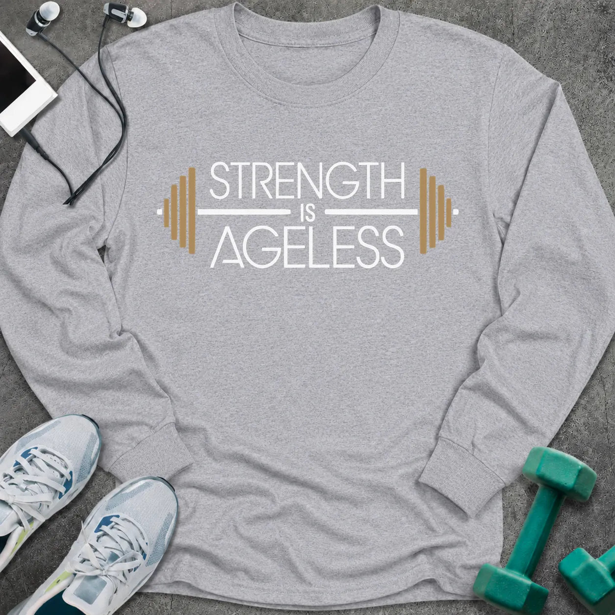 Sport grey long sleeve tee printed with "Strength is Ageless" in white and gold, with a barbell framing the words
