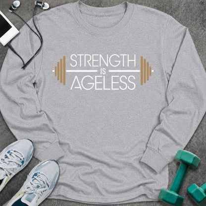Sport grey long sleeve tee printed with "Strength is Ageless" in white and gold, with a barbell framing the words