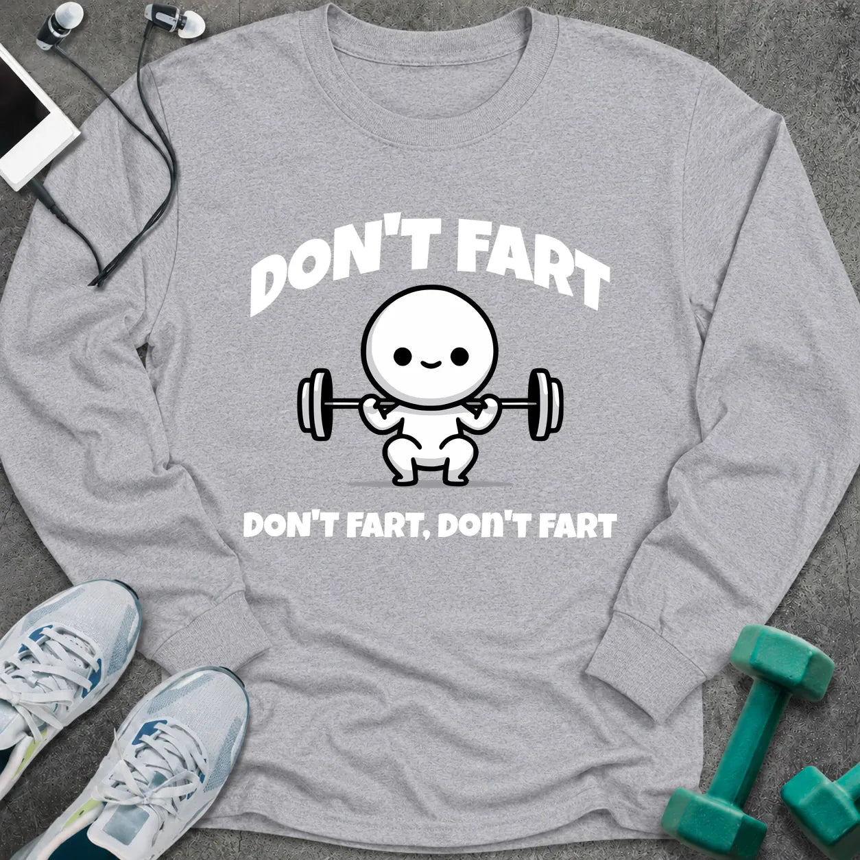 Sport grey long sleeve tee printed with "Don't Fart, Don't Fart, Don't Fart" in white, with a cartoon figure straining under a barbell