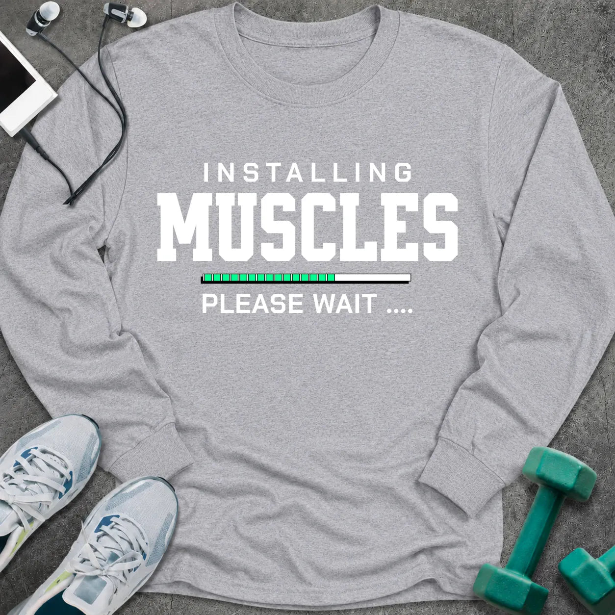 Sport grey long sleeve tee printed with "Installing Muscles Please Wait" in white, with a green loading bar