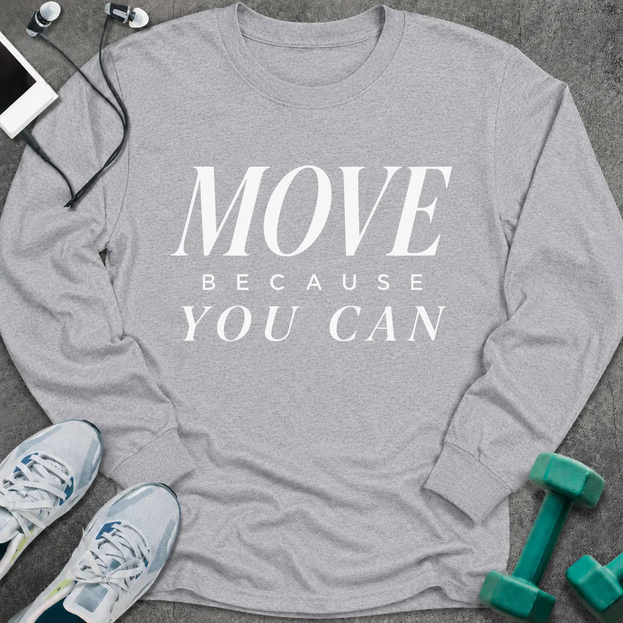 Sport grey long sleeve tee printed with "Move Because You Can" in white serif lettering