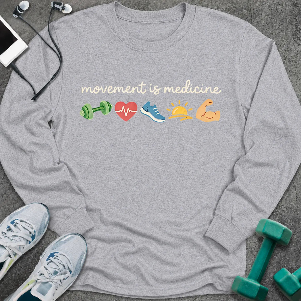 Sport grey long sleeve tee printed with "movement is medicine" in white script, with dumbbell, heart, running shoe, sunrise and flexed arm icons