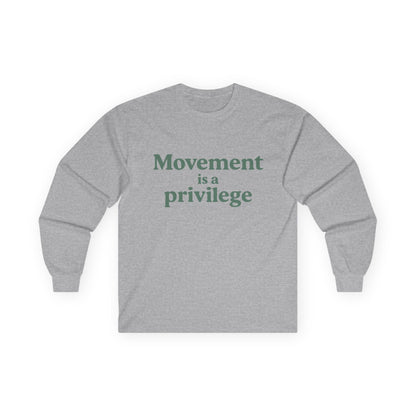Sport grey long sleeve tee printed with "Movement is a privilege" in green serif lettering