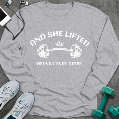 Sport grey long sleeve tee printed with "And She Lifted Heavily Ever After" in white, with a barbell topped with a crown