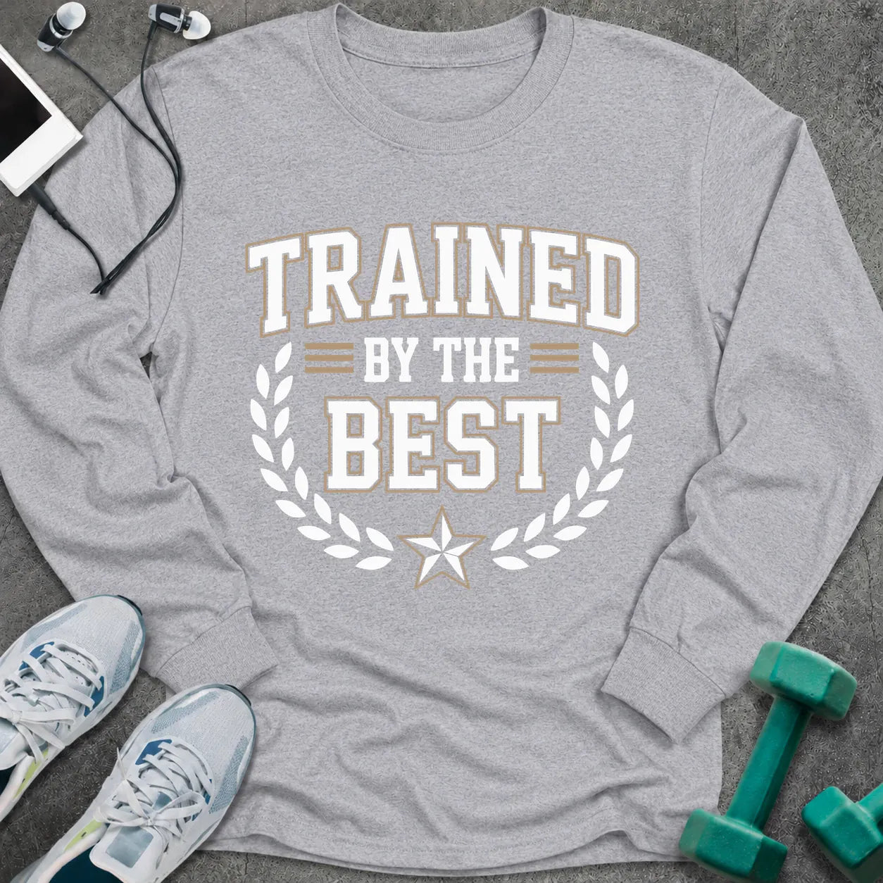 Sport grey long sleeve tee printed with "Trained By The Best" in white, with a laurel wreath and star