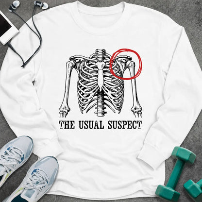 White long sleeve tee printed with "The Usual Suspect" in black, with a skeleton ribcage with one shoulder circled in red