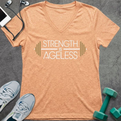 T-shirt printed with "Strength is Ageless" in white and gold, with barbell design elements