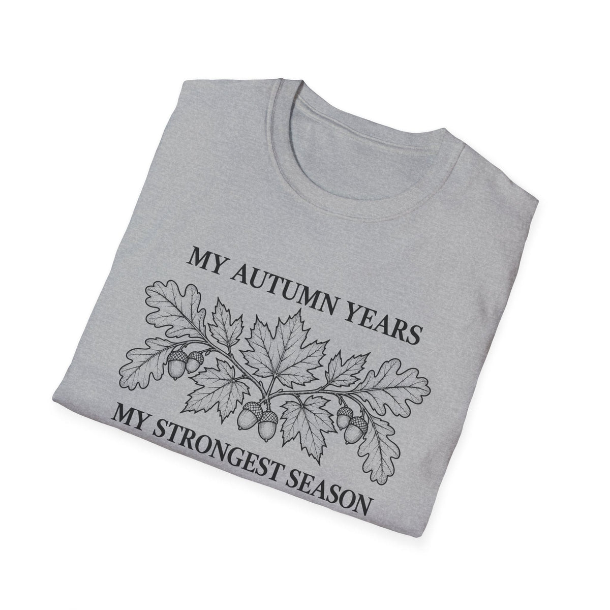 Folded sport grey t-shirt printed with "MY AUTUMN YEARS, MY STRONGEST SEASON" in black, with oak leaves and acorns