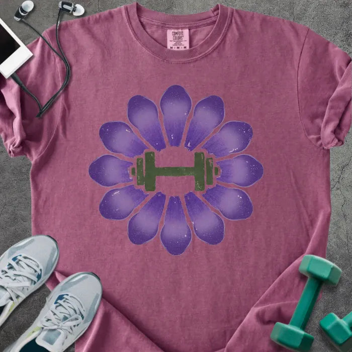 Berry t-shirt with purple crocus flowers and dumbbell in center in purple and green
