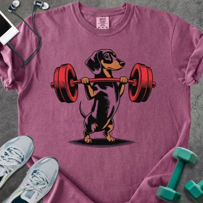 Berry t-shirt with a dachshund dog lifting a barbell in red