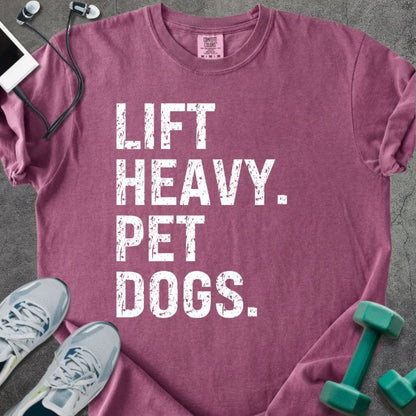 Berry t-shirt printed with "Lift Heavy. Pet Dogs." in white