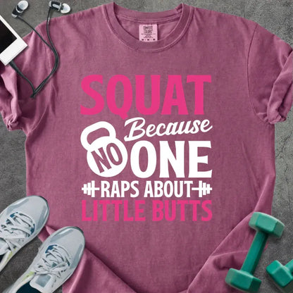 Berry t-shirt printed with "SQUAT Because NOBODY RAPS ABOUT LITTLE BUTTS" in pink and white