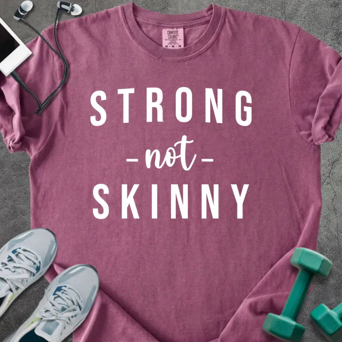 Berry t-shirt printed with "STRONG -not- SKINNY" in white