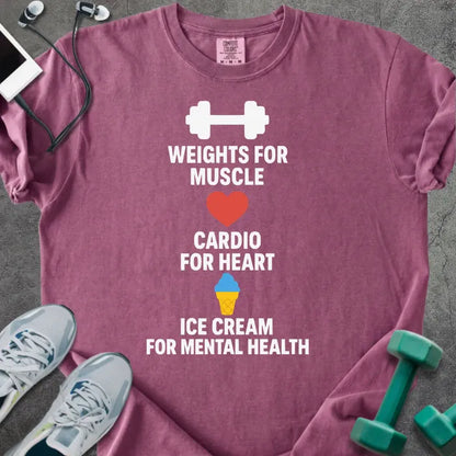 Berry t-shirt printed with "Weights for Muscle Cardio for Heart Ice Cream for Mental Health" in red, blue, yellow, with a dumbbell, heart, and ice cream cone icon between the lines