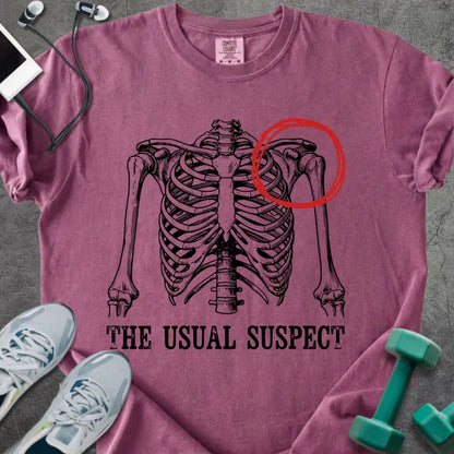 Berry t-shirt printed with "The Usual Suspect", with skeleton ribcage and red circled heart