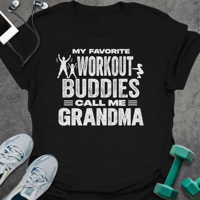 Black t-shirt printed with "MY FAVORITE WORKOUT BUDDIES CALL ME GRANDMA" in white, with a grandmother and two kids doing jumping jacks and squats