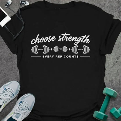 Black t-shirt printed with "choose strength EVERY REP COUNTS" in white, with three dumbbell graphics