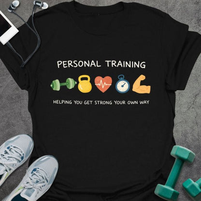 Black t-shirt printed with "Personal Training Helping You Get Strong Your Own Way" in green, yellow, red, blue, orange, with dumbbell, kettlebell, heart rate, timer, and bicep icons
