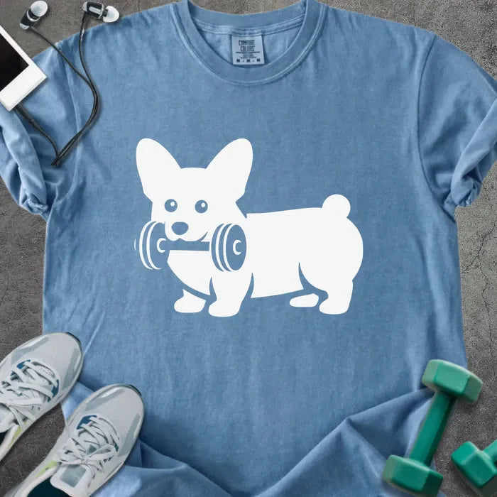 Blue jean t-shirt with a corgi holding dumbbells graphic in white