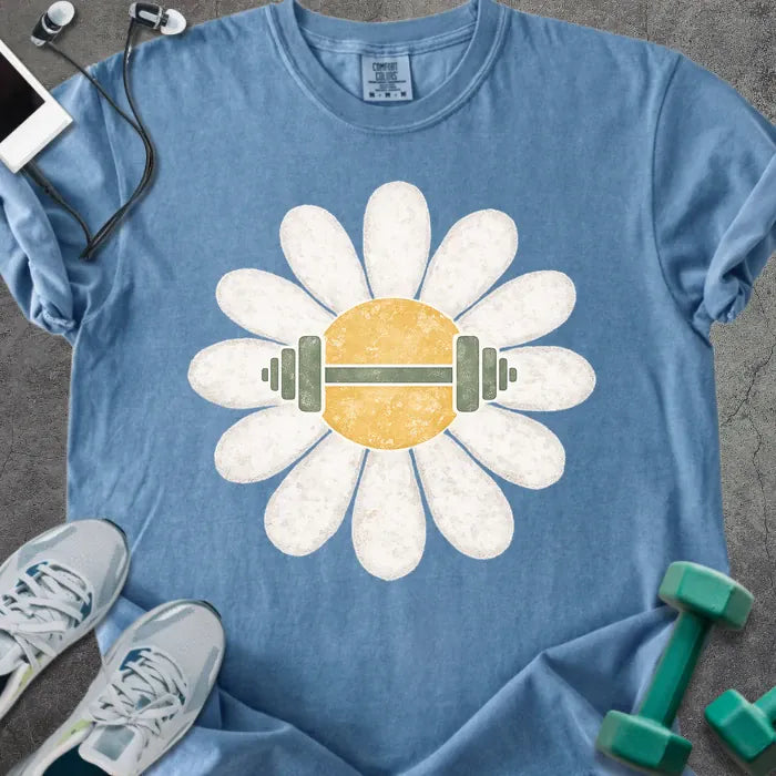 Blue jean t-shirt with white daisy and barbell in center in white and yellow
