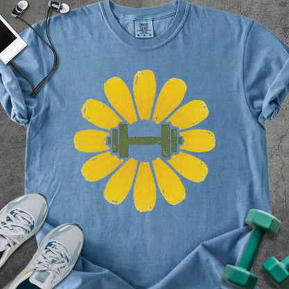 Blue jean t-shirt with yellow dandelion flower and dumbbell in center in yellow and green