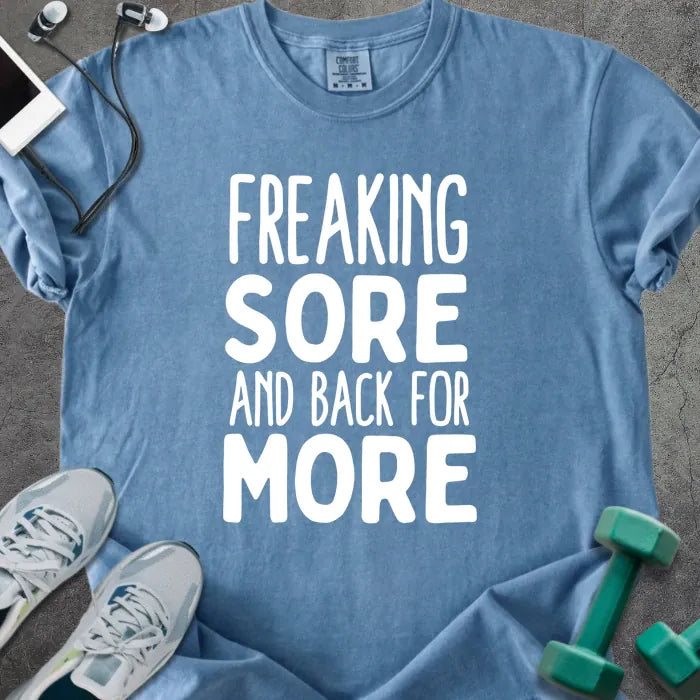 Blue jean t-shirt printed with "Freaking Sore and Back for More" in white