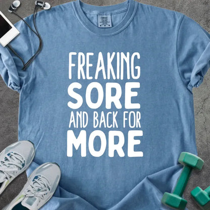 Blue jean t-shirt printed with "Freaking Sore and Back for More" in white