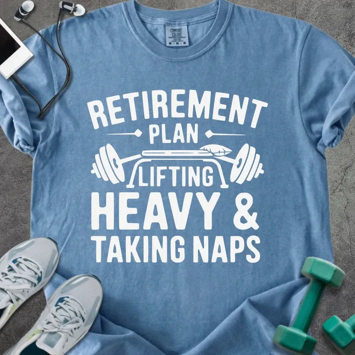 Blue jean t-shirt printed with "Retirement Plan Lifting Heavy & Taking Naps" in white, with a barbell
