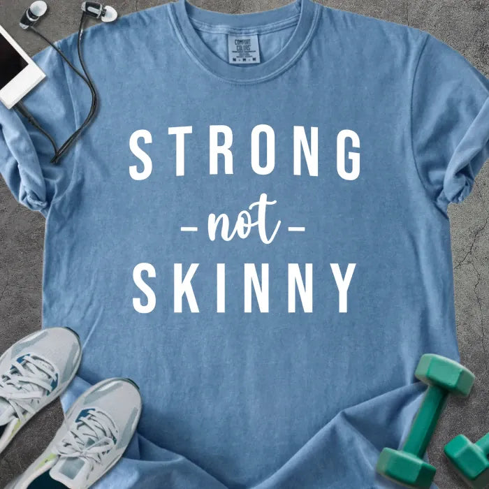 Blue jean t-shirt printed with "STRONG -not- SKINNY" in white
