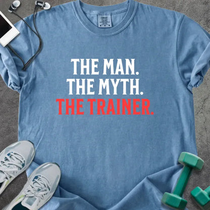 Blue jean t-shirt printed with "The Man. the Myth. the Trainer." in red