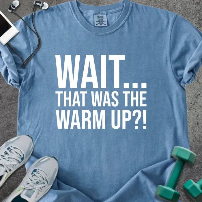 Blue jean t-shirt printed with "Wait... That Was the Warm Up?!" in white