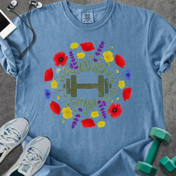 Blue jean t-shirt with colorful wildflowers and dumbbells in circular arrangement in red, yellow, purple, blue, and green