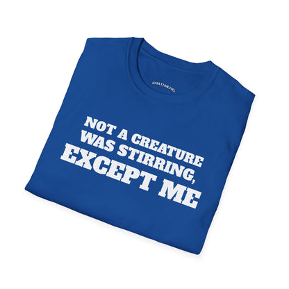 Folded royal blue t-shirt printed with "NOT A CREATURE WAS STIRRING, EXCEPT ME" in white