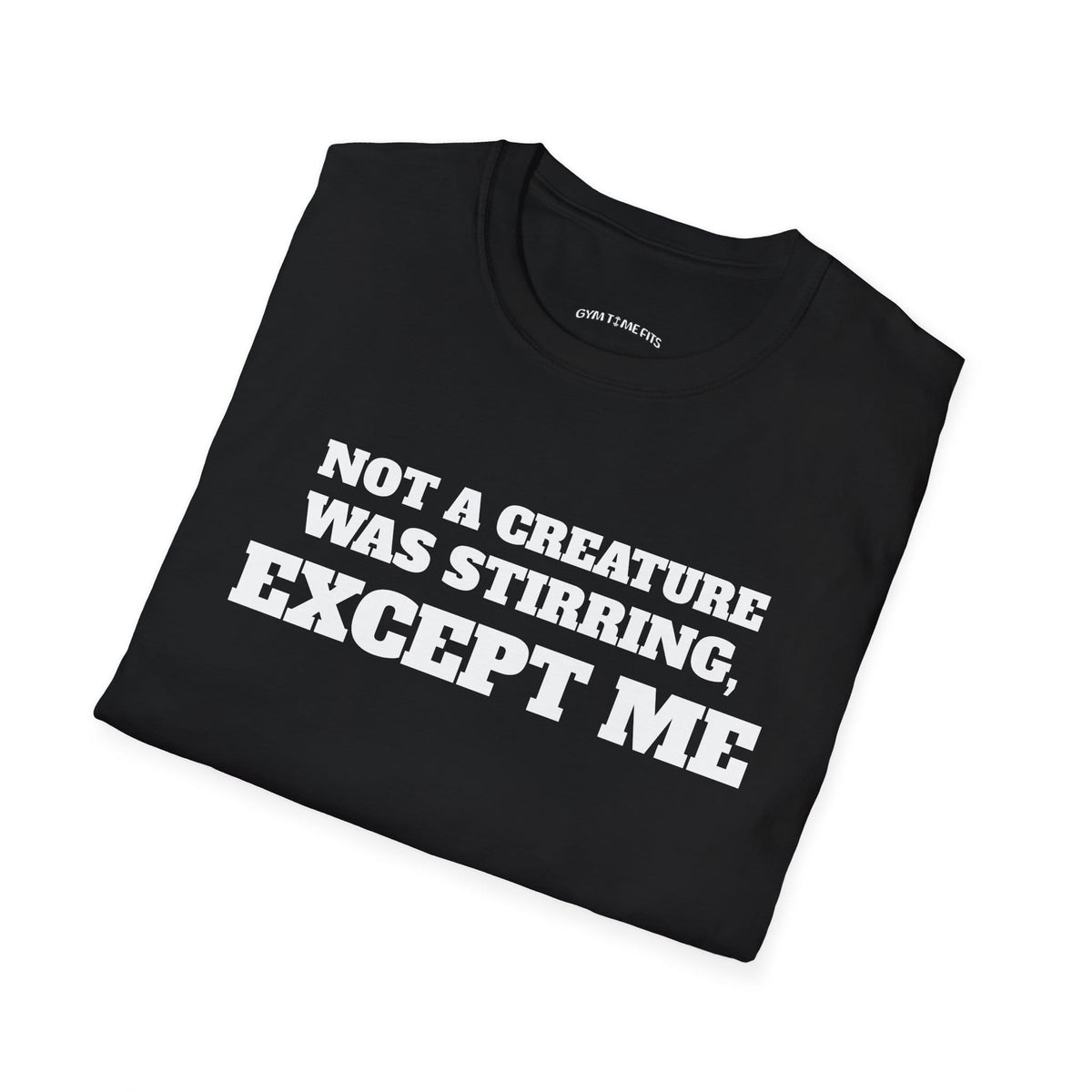 Folded black t-shirt printed with "NOT A CREATURE WAS STIRRING, EXCEPT ME" in white