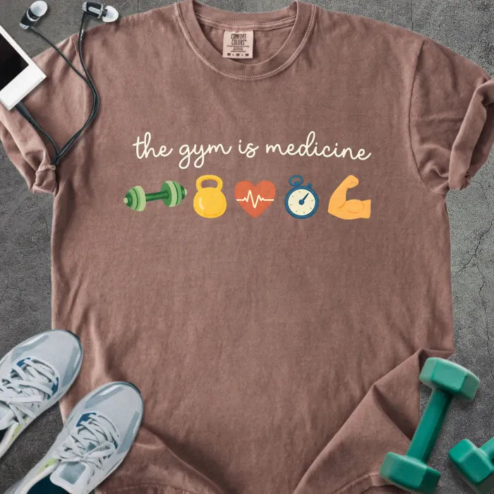 Espresso t-shirt printed with "the gym is medicine 💪 🏋️ 💓 ⏰ 💪" in white and multicolor