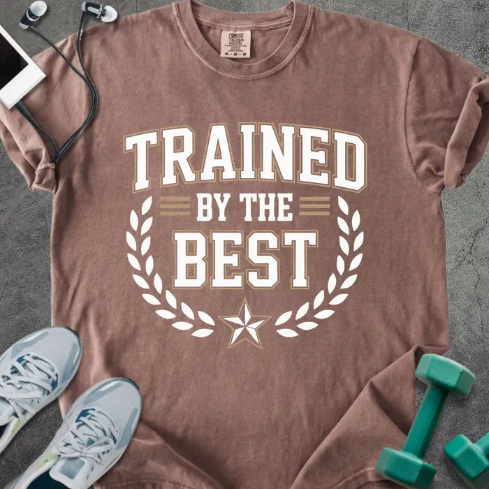 Espresso t-shirt printed with "Trained By the Best" in tan and white, with laurel wreath and star