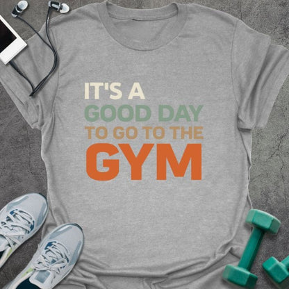 T-shirt printed with "It's a Good Day to Go to the Gym" in multi-color