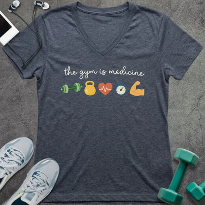 Heather navy t-shirt printed with "the gym is medicine" in yellow and orange, with dumbbell, kettlebell, heartbeat, weight scale, clock, and bicep graphics