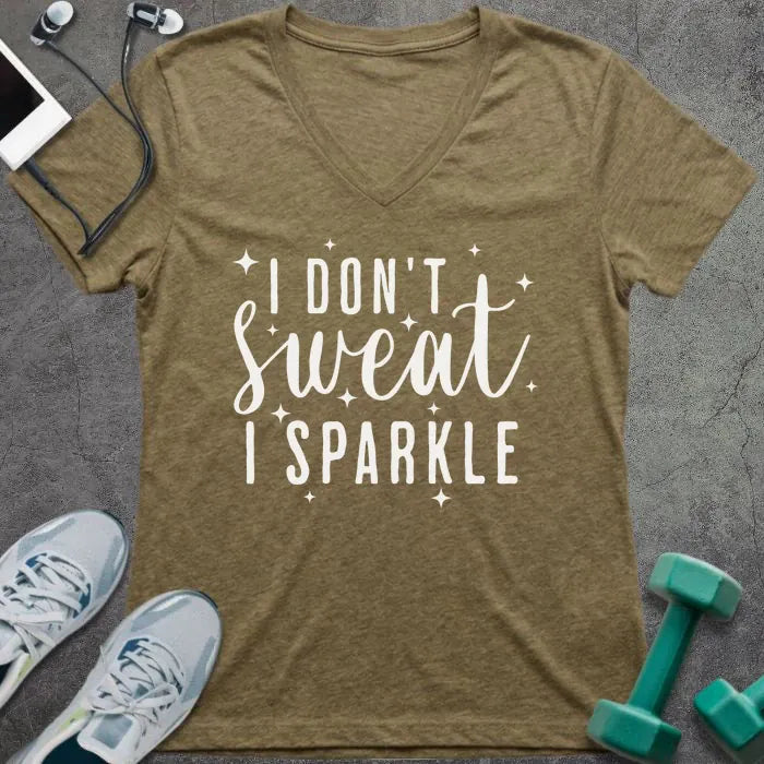 Heather olive t-shirt printed with "I Don't Sweat, I Sparkle" in white, with sparkle graphics