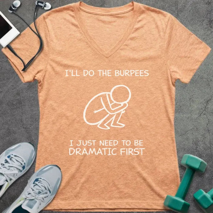 Heather peach t-shirt printed with "I'll Do the Burpees I Just Need to Be Dramatic First", with a stick figure doing a backflip